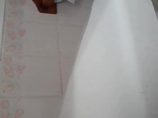 Paki slut big ass from Bristol in toilet taking a piss